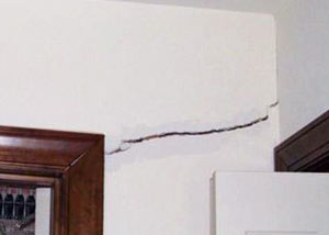 A large drywall crack in an interior wall in Houma